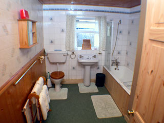 The bathroom with bath and shower